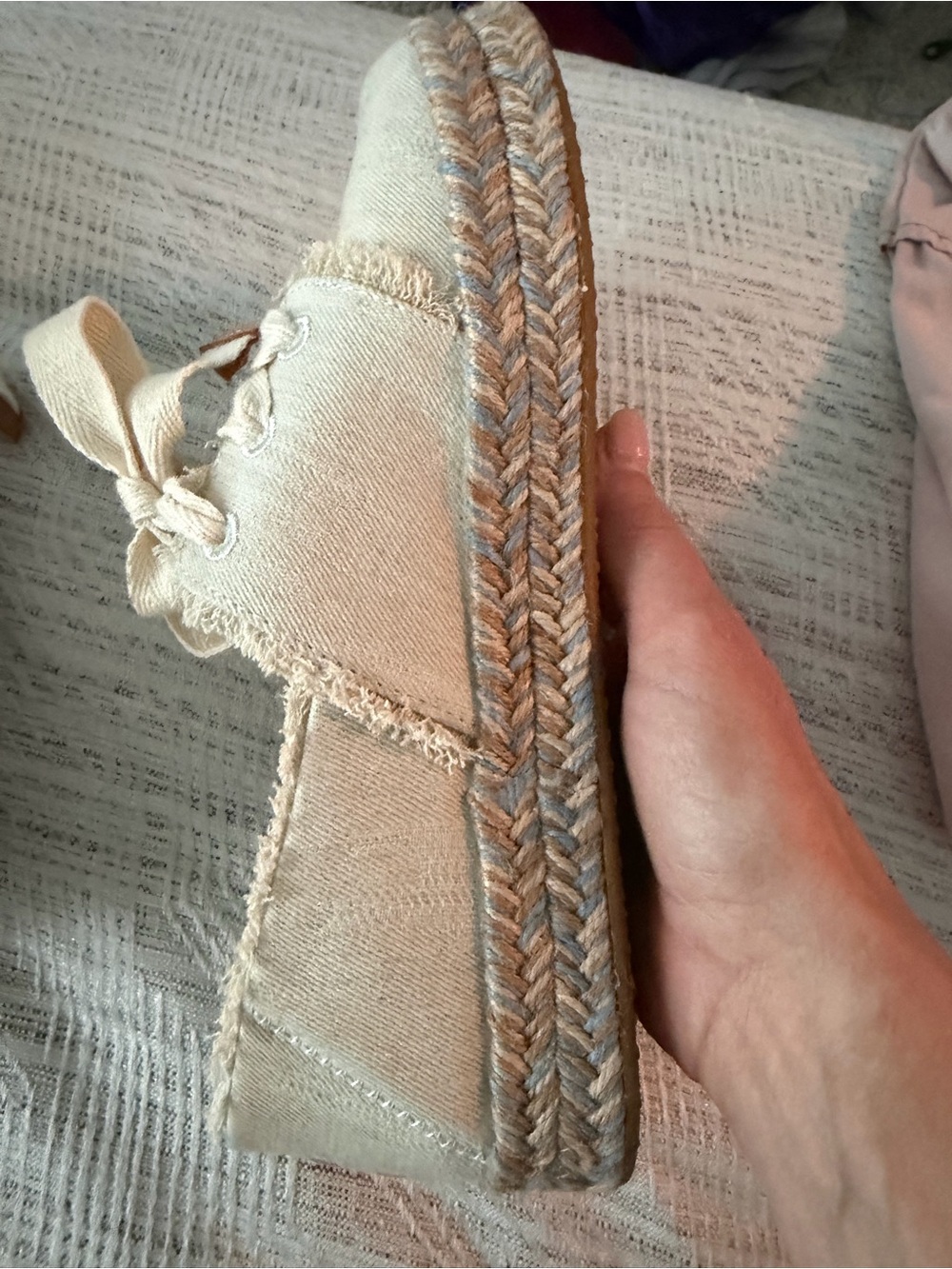 TOMS Cream Canvas Slip-Ons with Bow Accent